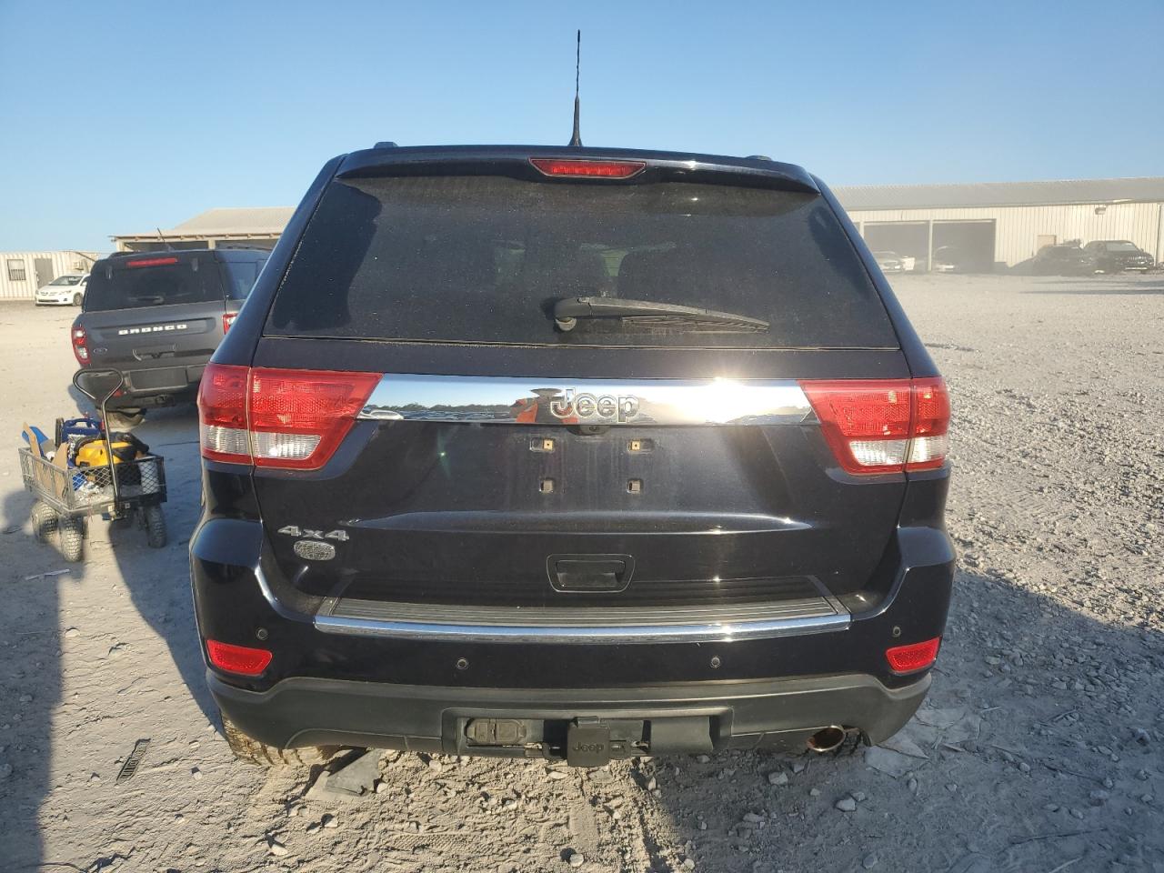 2011 Jeep Grand Cherokee Overland VIN: 1J4RR6GG4BC524928 Lot: 82211755