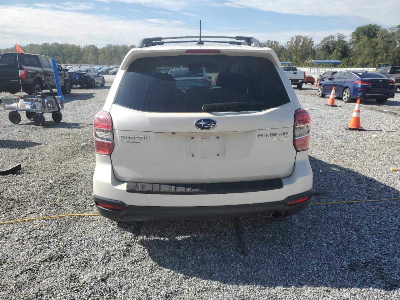 2014 Subaru Forester 2.5I Touring VIN: JF2SJAMC2EH509713 Lot: 81847395