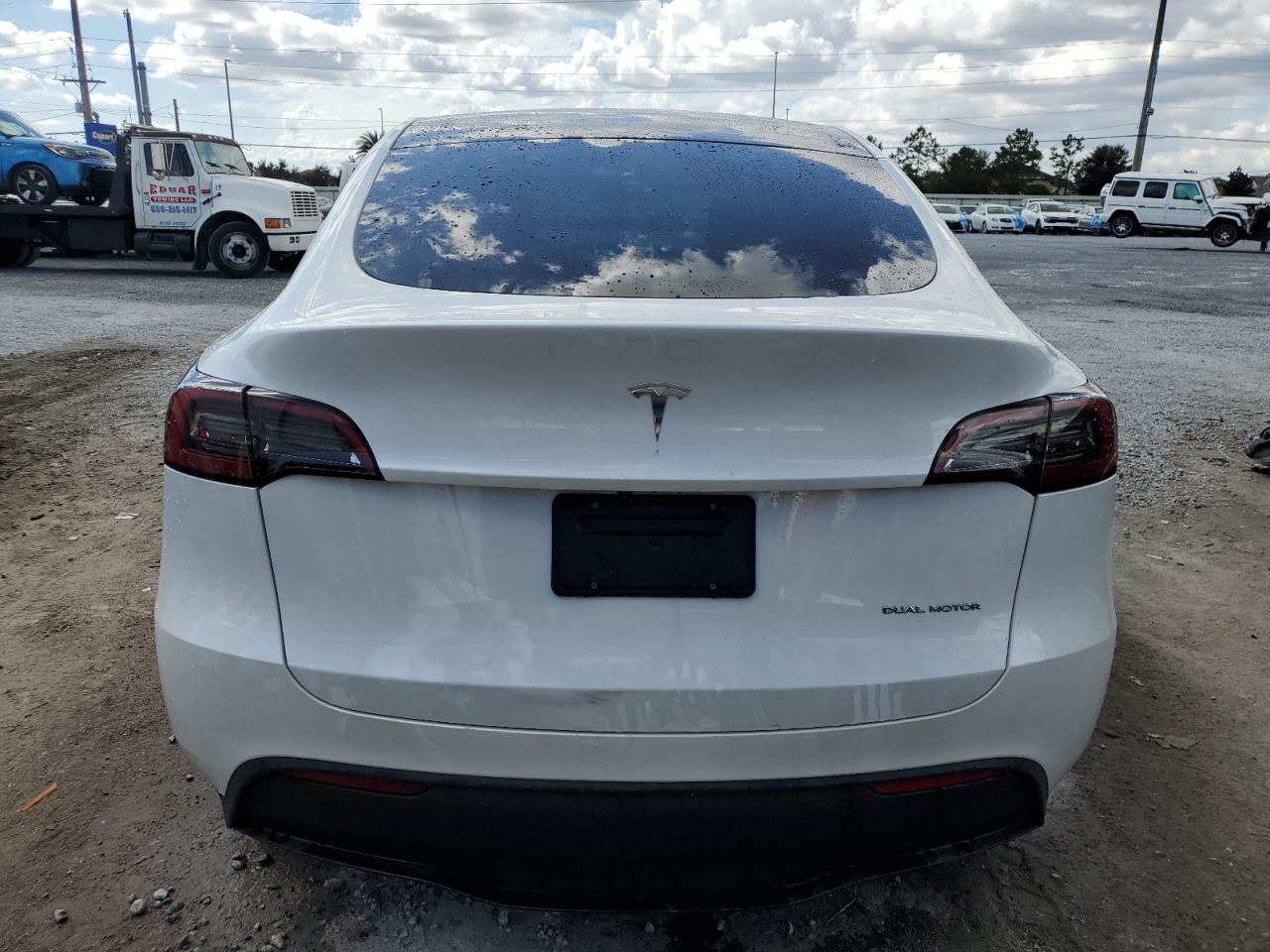 2023 Tesla Model Y VIN: 7SAYGDEE2PA051893 Lot: 85704345