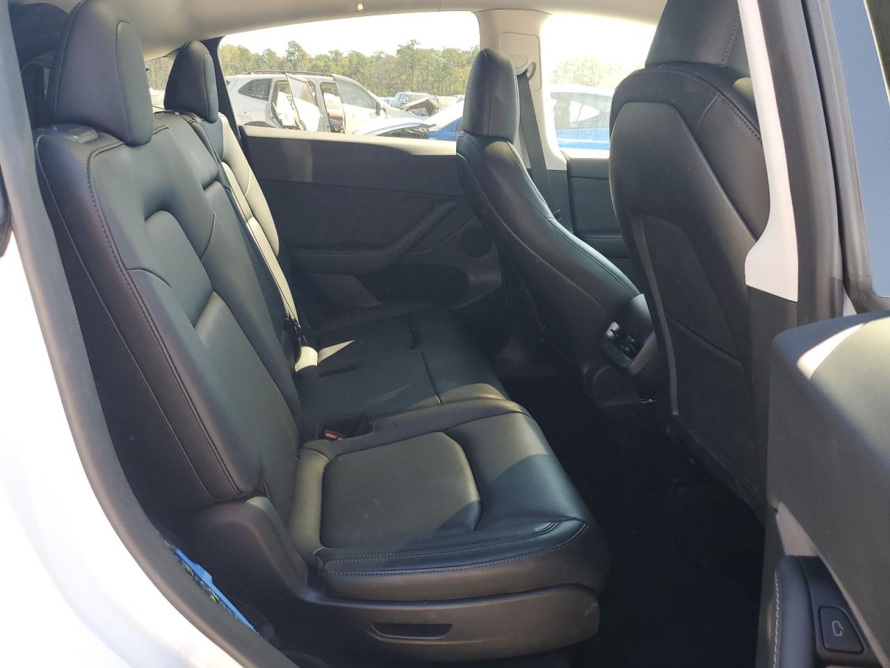 2023 Tesla Model Y VIN: 7SAYGAEE7PF877589 Lot: 87102585