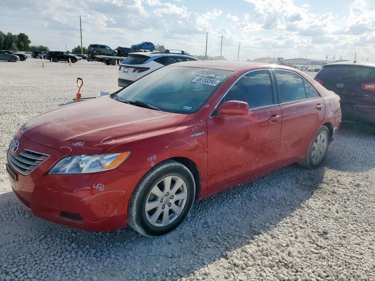 2007 Toyota Camry Hybrid red sedan hybrid 4T1BB46K37U005551 photo #1