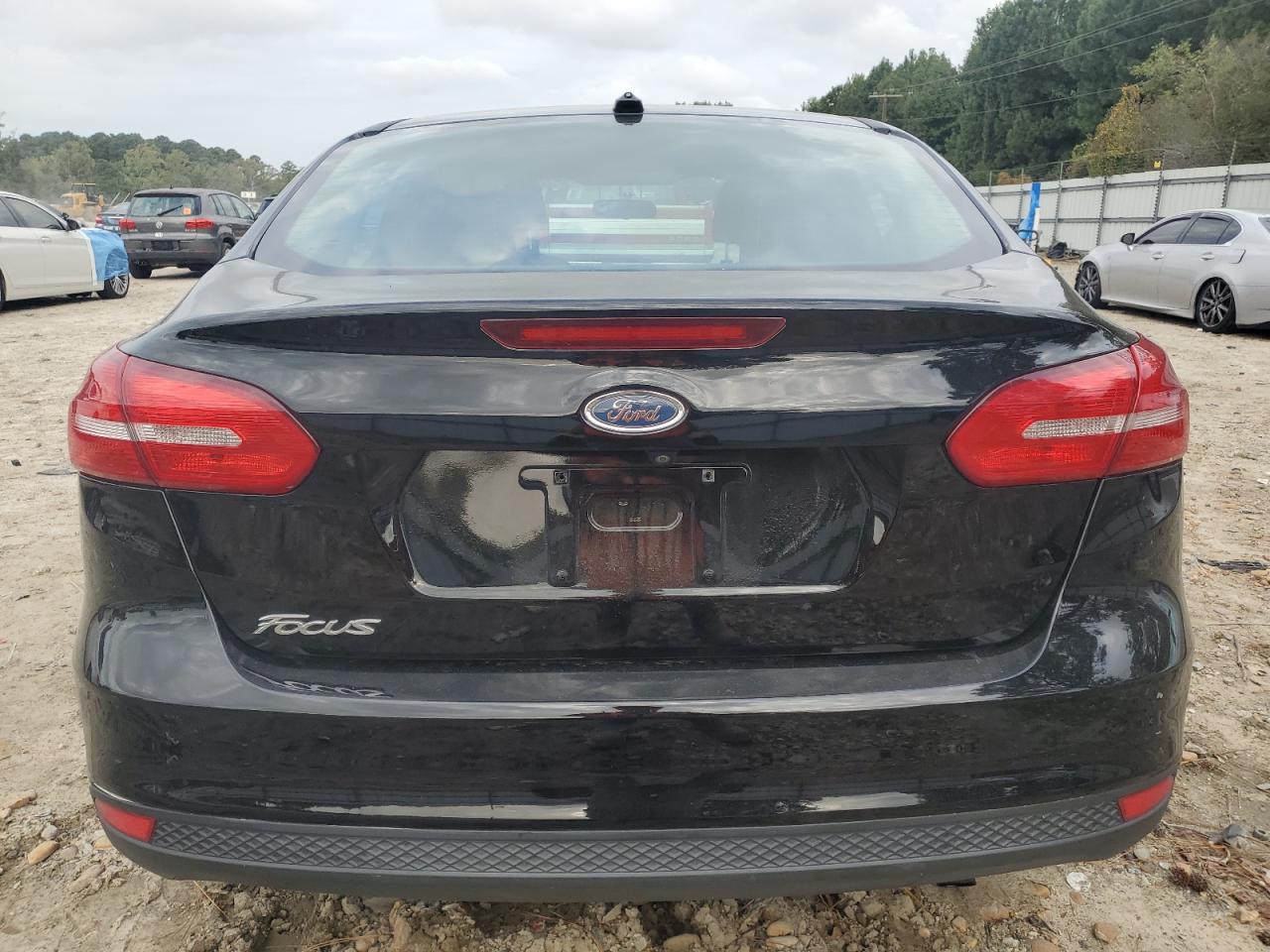 2015 Ford Focus Se VIN: 1FADP3F22FL329786 Lot: 84889115