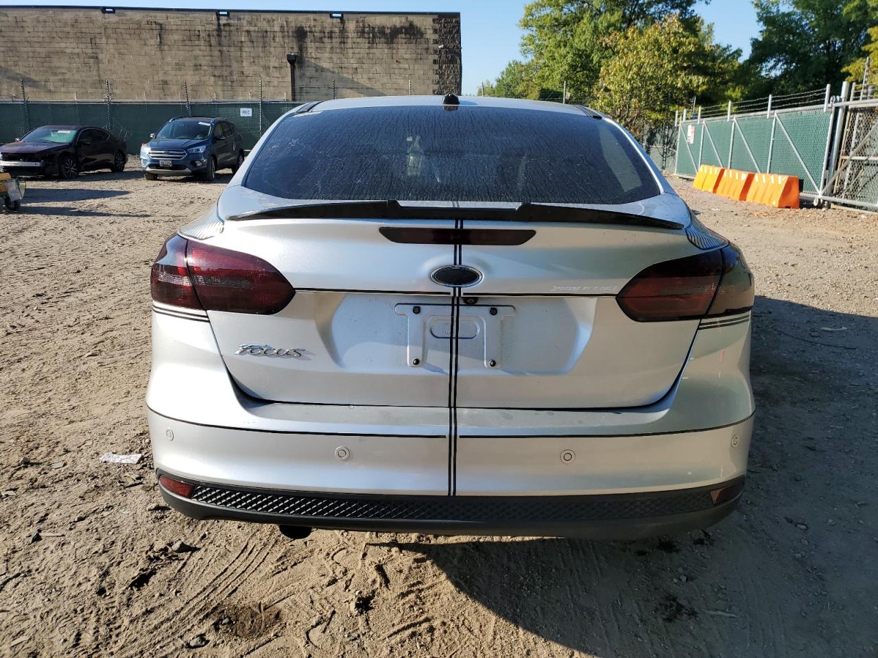 2016 Ford Focus Se VIN: 1FADP3F22GL321169 Lot: 85168935