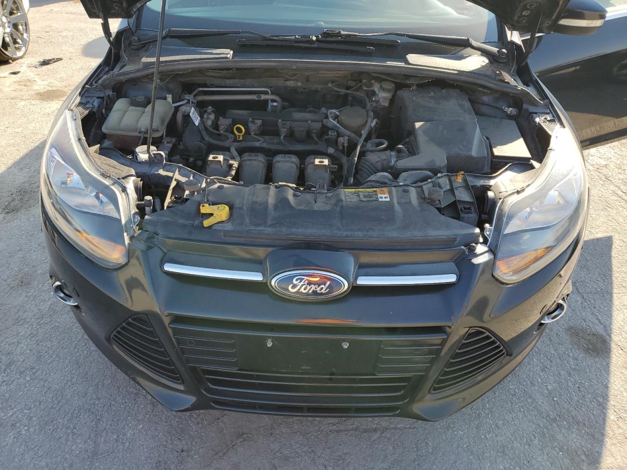 2014 Ford Focus Titanium VIN: 1FADP3J2XEL161594 Lot: 82163935