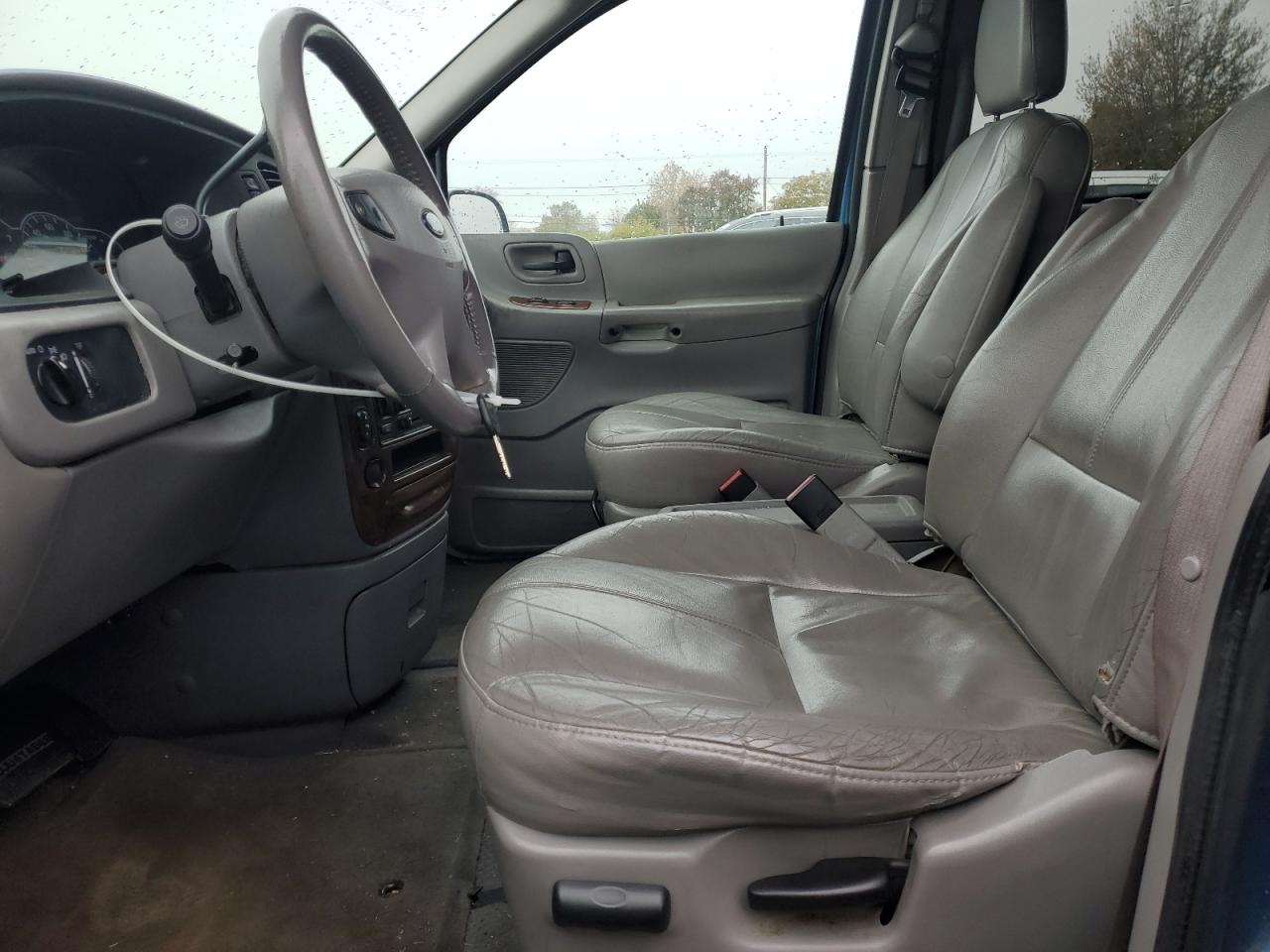 2003 Ford Windstar Sel VIN: 2FMZA53423BB11180 Lot: 82746695