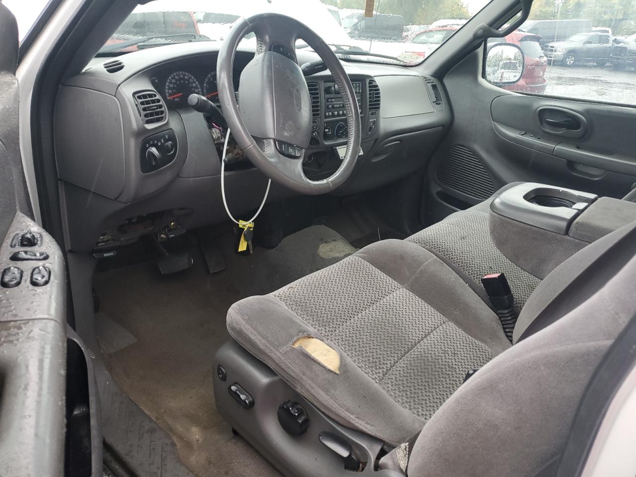 2002 Ford F150 VIN: 1FTRX18L12NA58230 Lot: 82699215