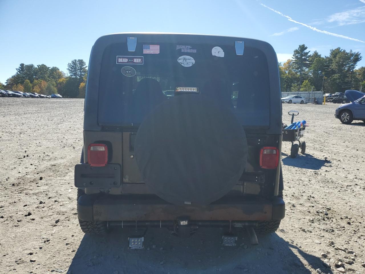 2000 Jeep Wrangler / Tj Sport VIN: 1J4FA49S1YP796600 Lot: 82574545