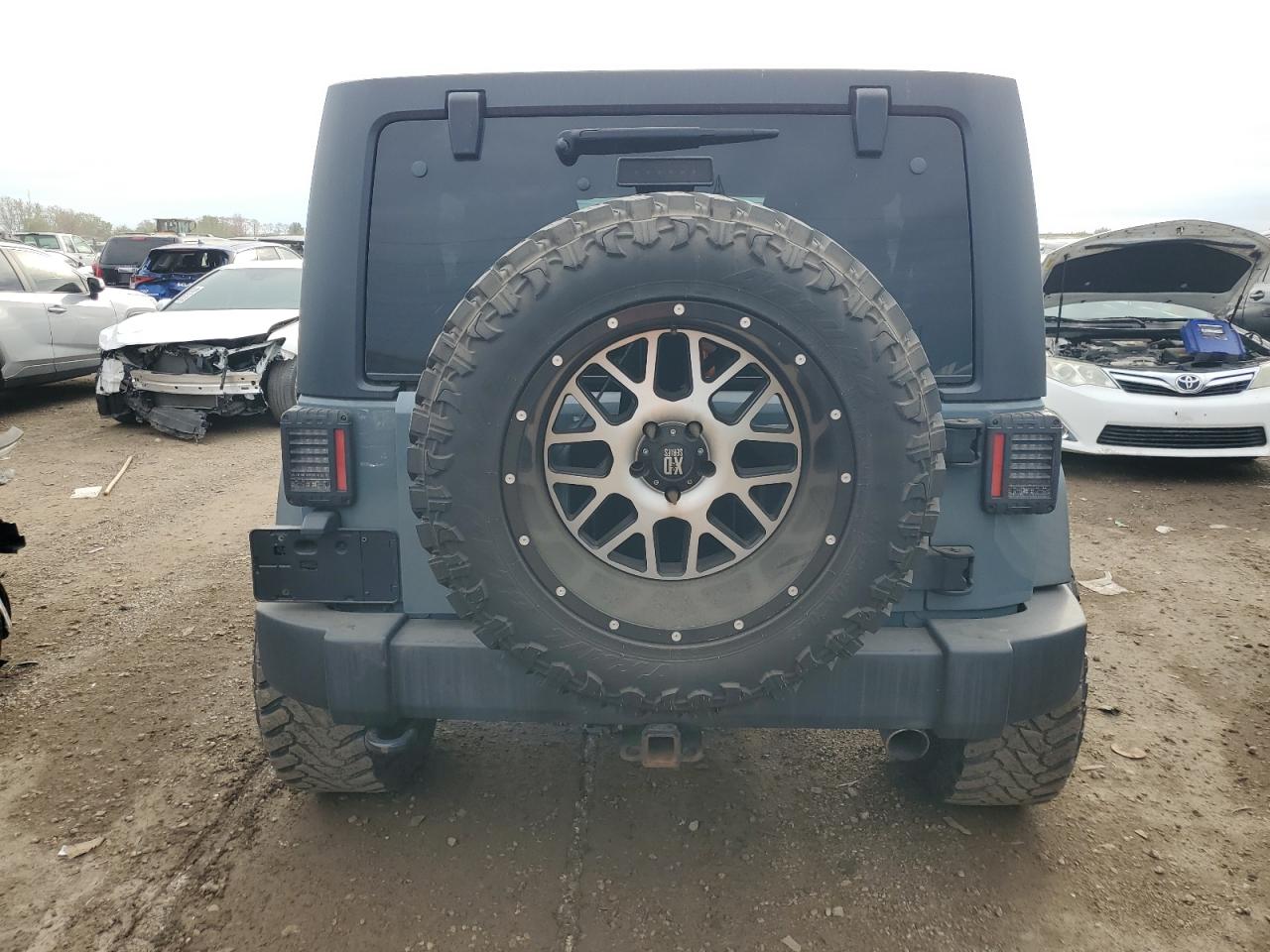 2014 Jeep Wrangler Unlimited Sport VIN: 1C4BJWDG3EL176935 Lot: 86285465