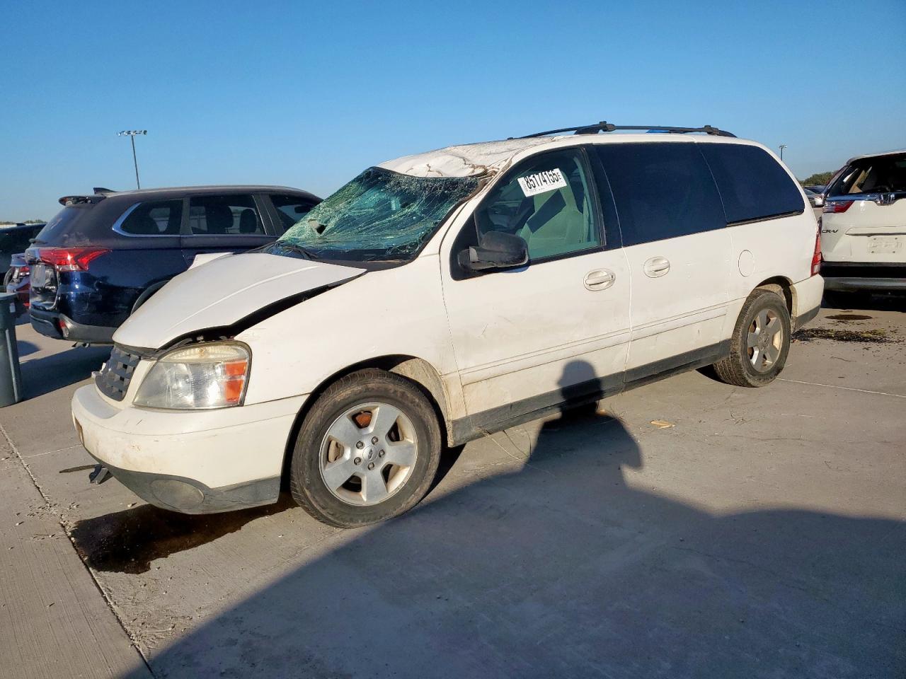 FORD FREESTAR 2004. Lot# 85174155. VIN 2FMZA57604BB12938. Photo 1