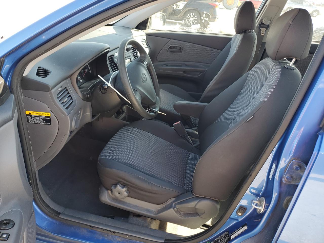 2009 Kia Rio Base VIN: KNADE223296543590 Lot: 89835285