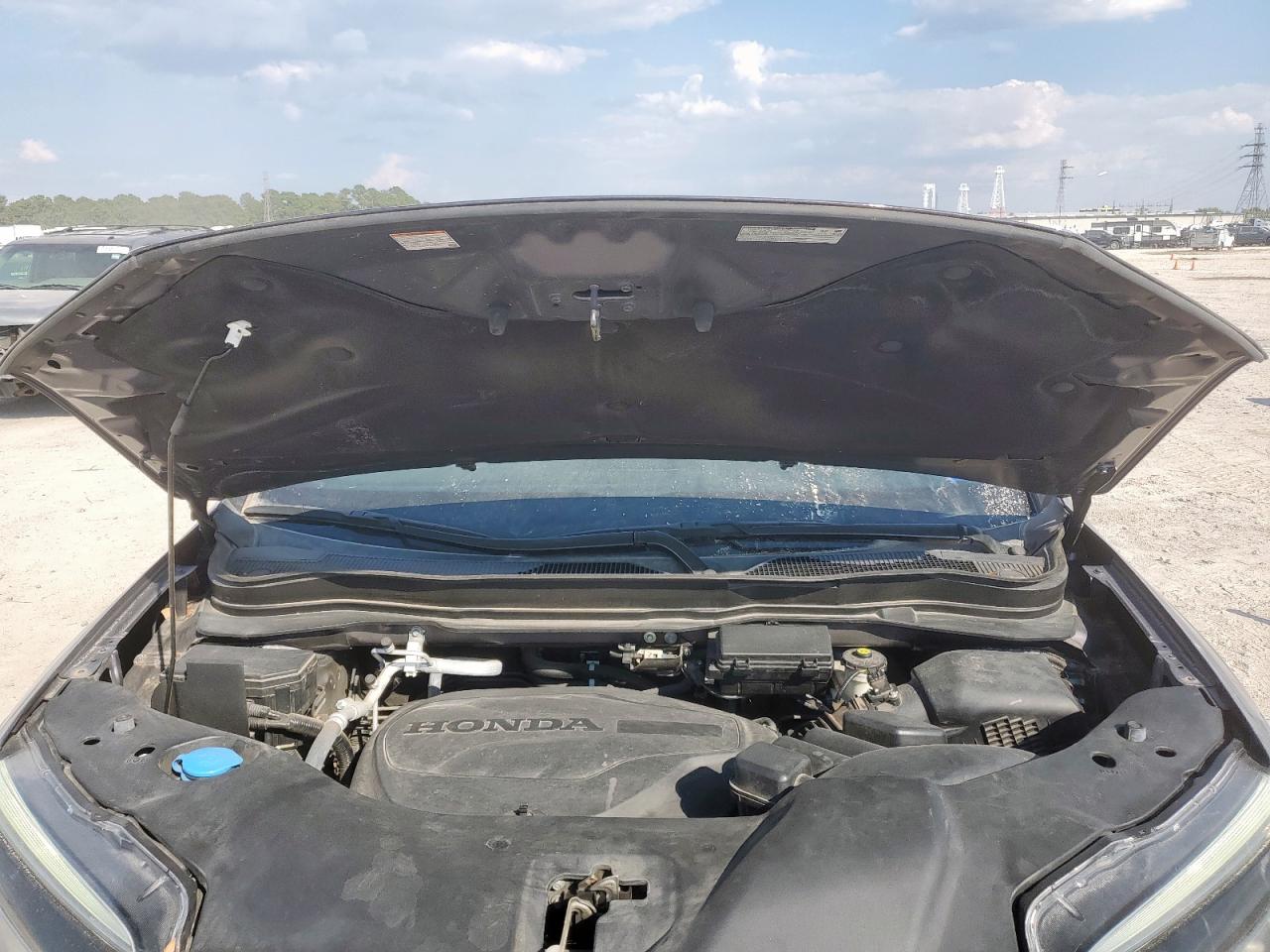 2021 Honda Passport Touring VIN: 5FNYF7H98MB010750 Lot: 82175355