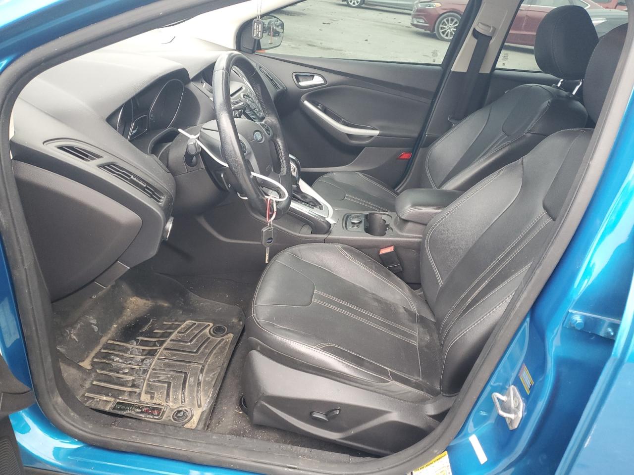 2014 Ford Focus Se VIN: 1FADP3K21EL129373 Lot: 86070535