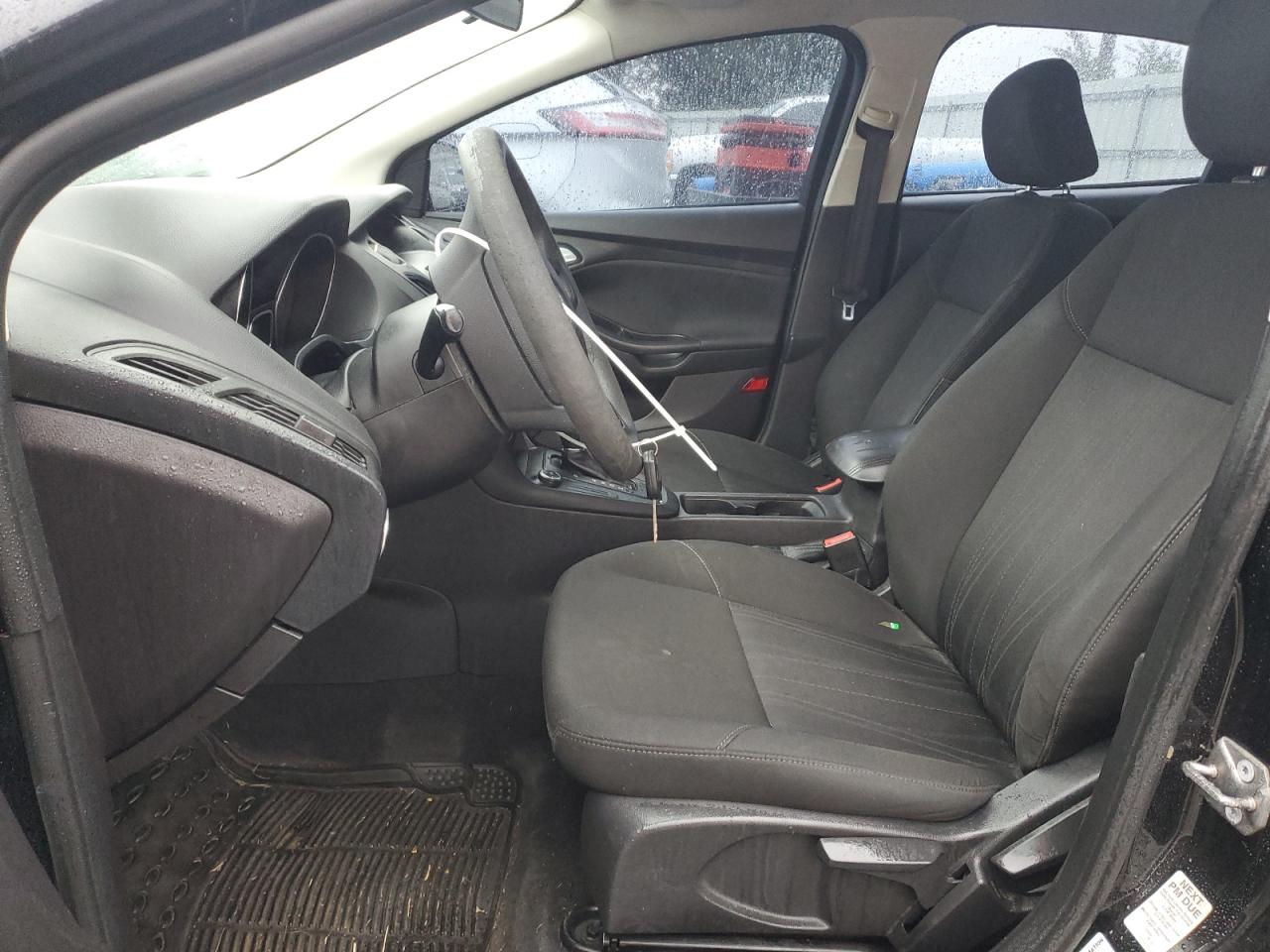 2015 Ford Focus Se VIN: 1FADP3F2XFL205488 Lot: 85360705