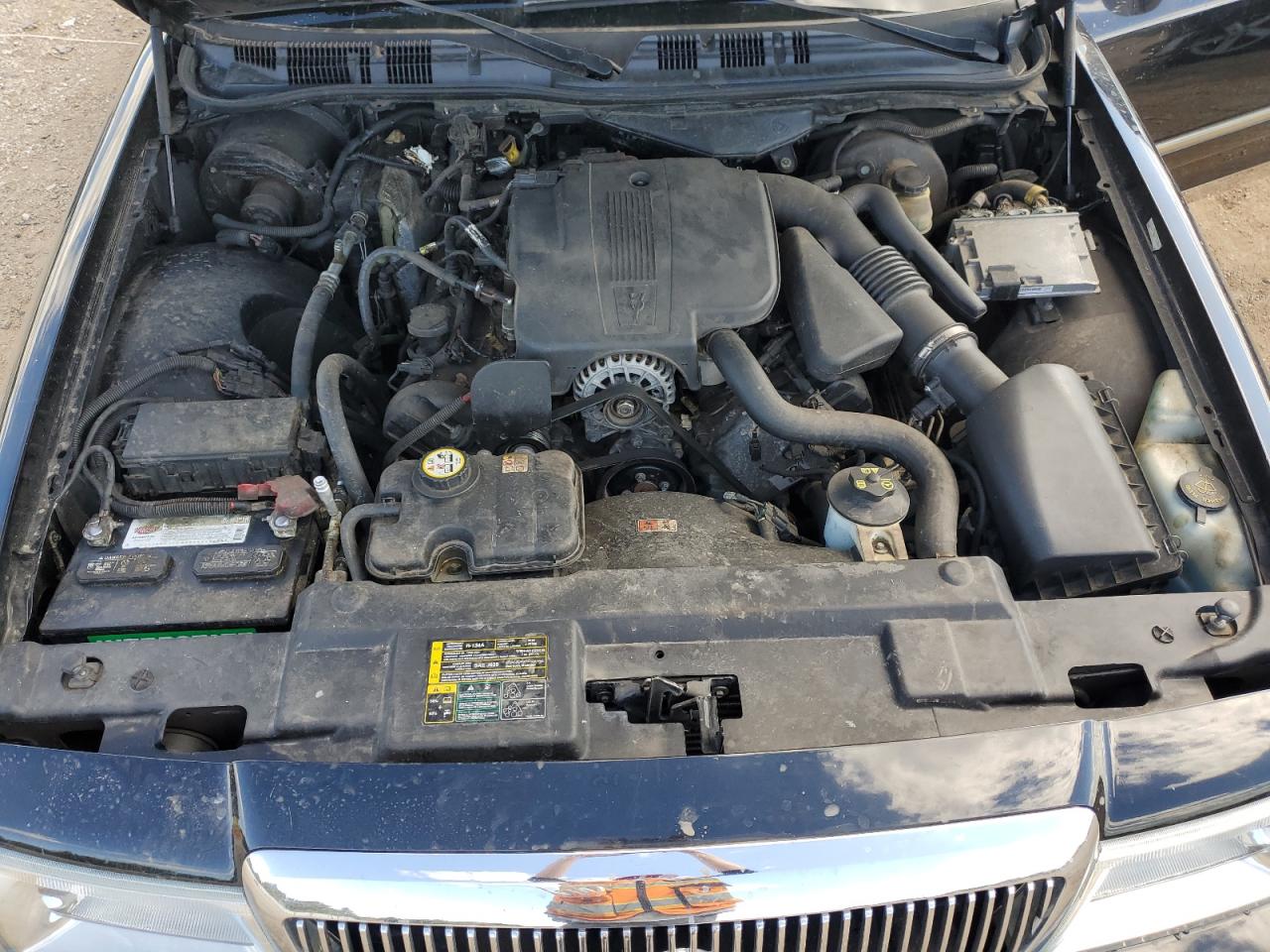 2005 Mercury Grand Marquis Gs VIN: 2MEFM74W95X659594 Lot: 84277265