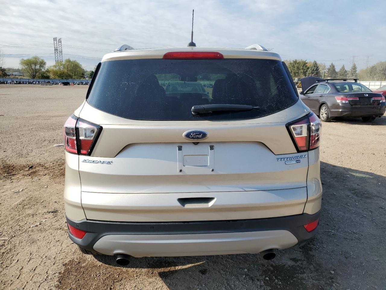 2017 Ford Escape Titanium VIN: 1FMCU9J9XHUC74423 Lot: 86194825
