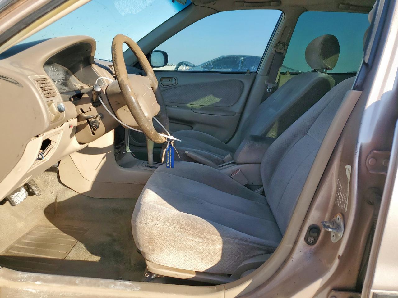 1999 Toyota Corolla VIN: 1NXBR12E8XZ212253 Lot: 82281415