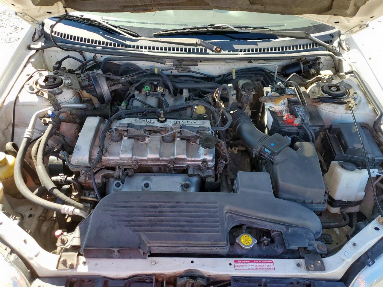 2003 Mazda Protege Dx VIN: JM1BJ225730193388 Lot: 90106055