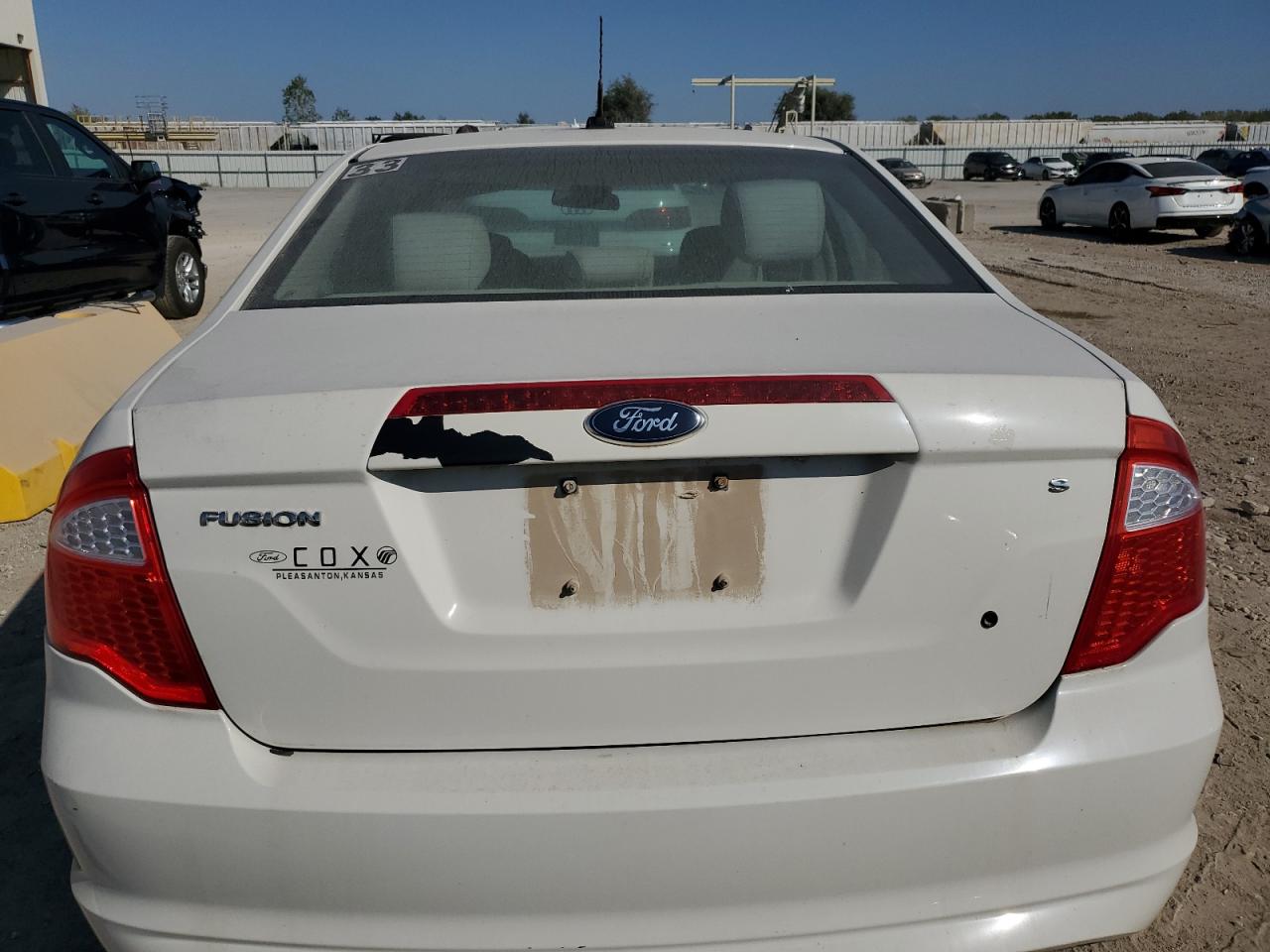 2011 Ford Fusion S VIN: 3FAHP0GA9BR144877 Lot: 84523585