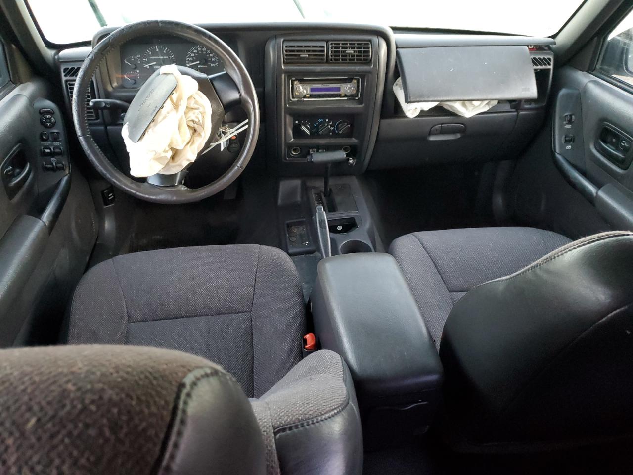 1999 Jeep Cherokee Sport VIN: 1J4FT68S2XL670579 Lot: 90354775