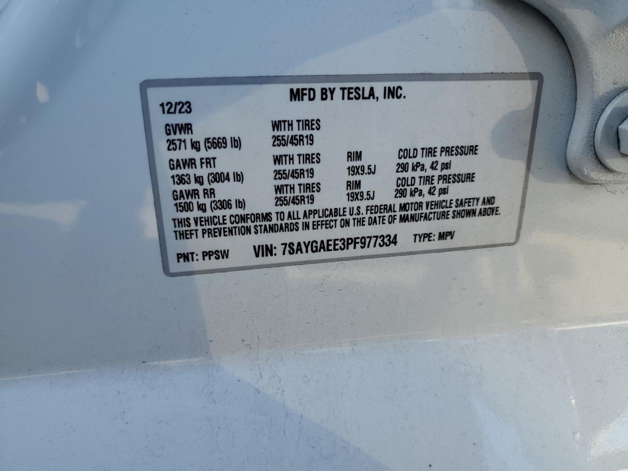 2023 Tesla Model Y VIN: 7SAYGAEE3PF977334 Lot: 90600845