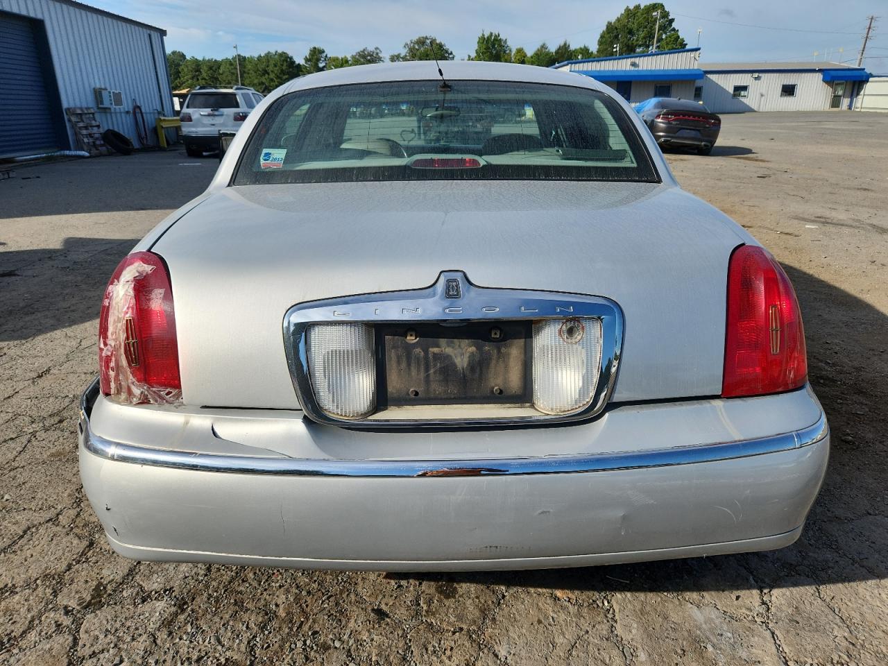 1998 Lincoln Town Car Cartier VIN: 1LNFM83W6WY702858 Lot: 85010175