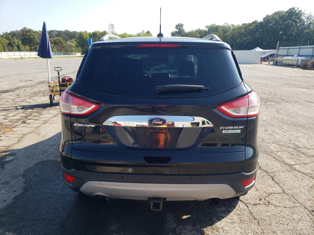 2015 Ford Escape Titanium VIN: 1FMCU0J91FUB11409 Lot: 84540405