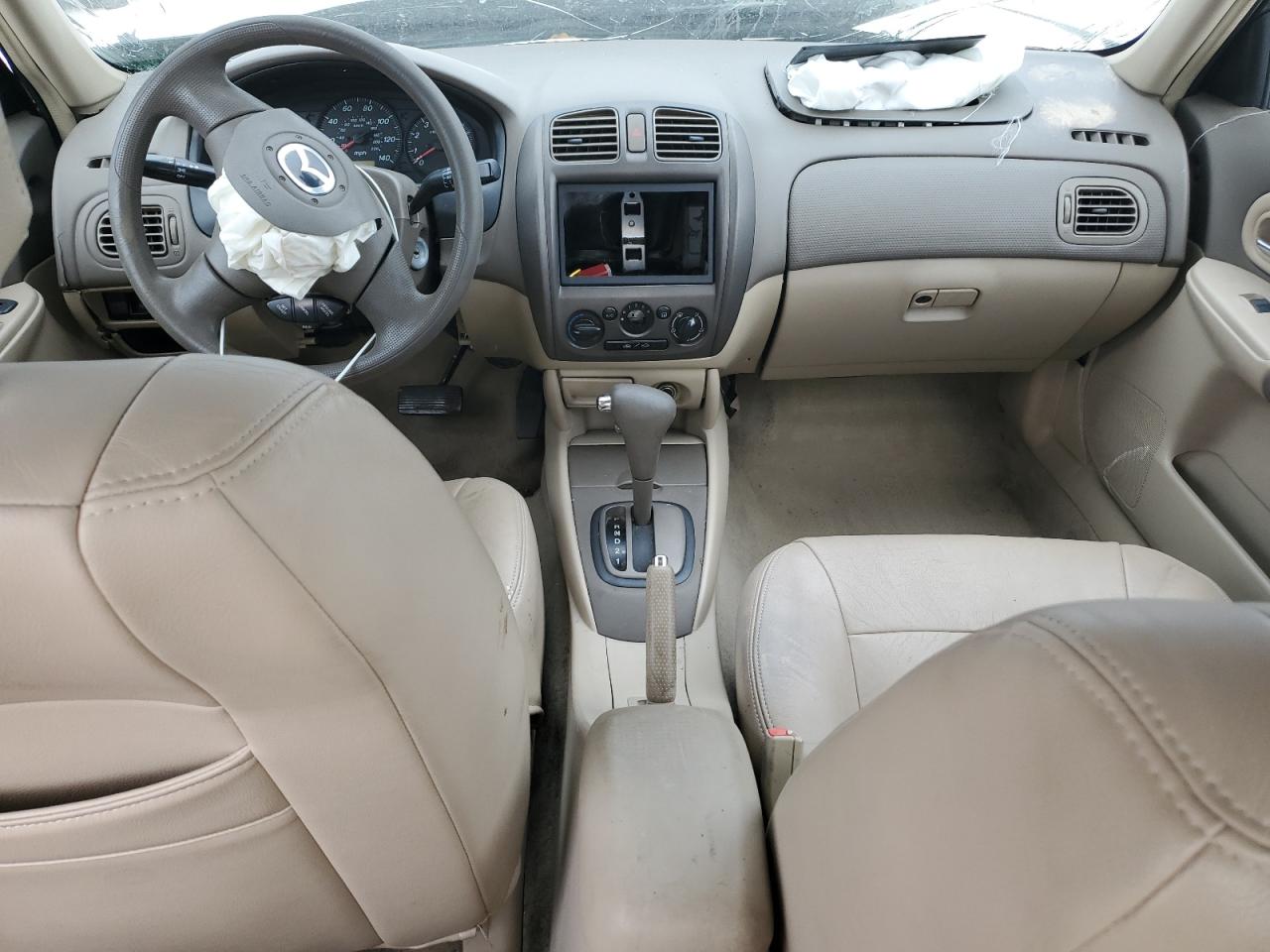 2002 Mazda Protege Dx VIN: JM1BJ225520506257 Lot: 82216225