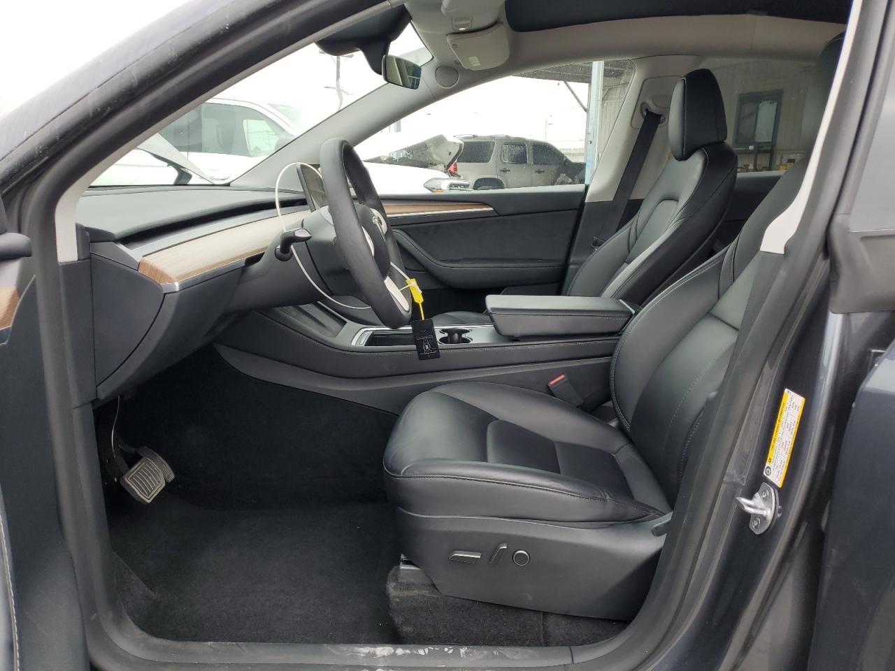 2023 Tesla Model Y VIN: 7SAYGDEE9PF889177 Lot: 82357825