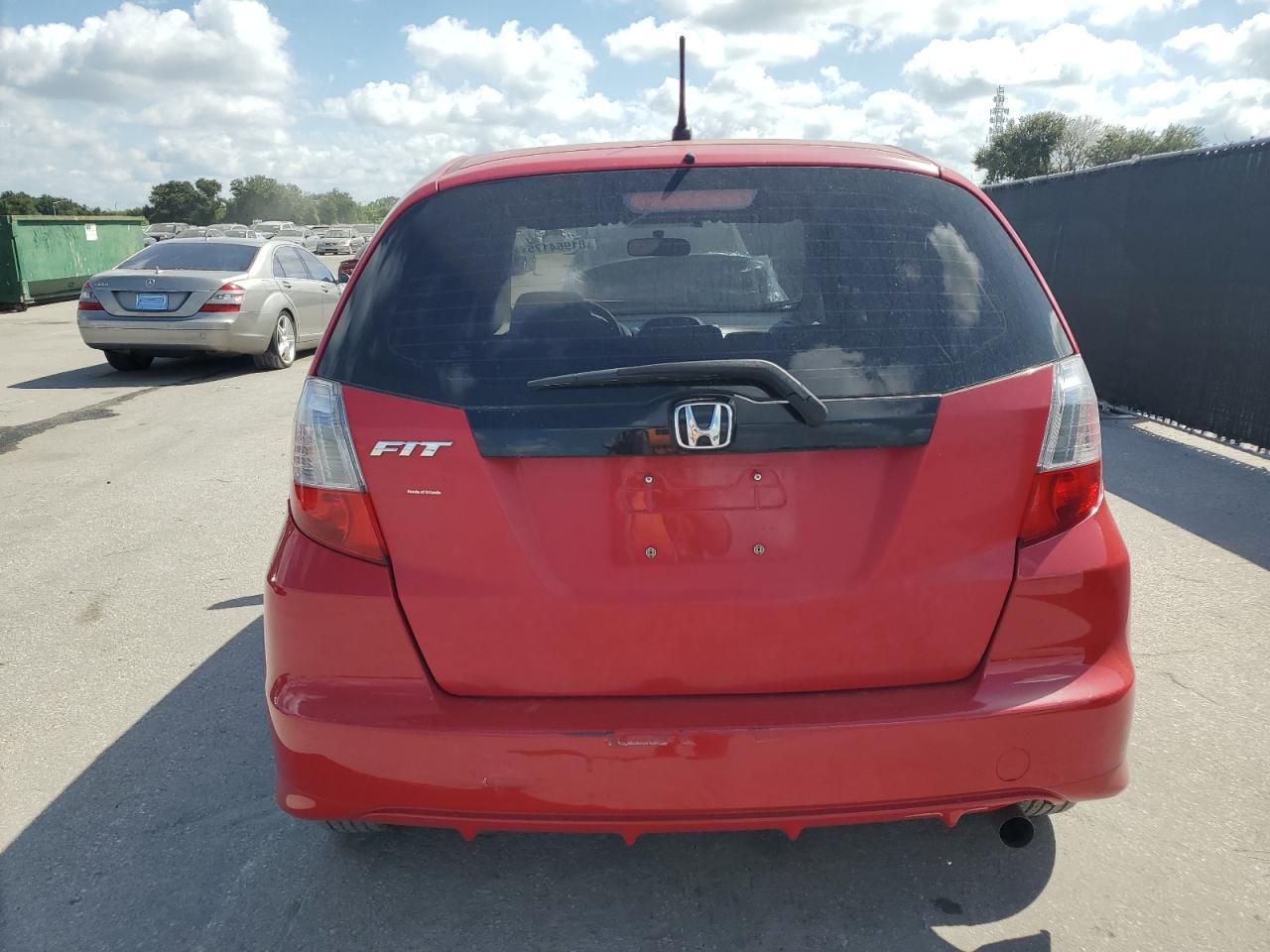2012 Honda Fit VIN: JHMGE8H33CC009709 Lot: 81964175