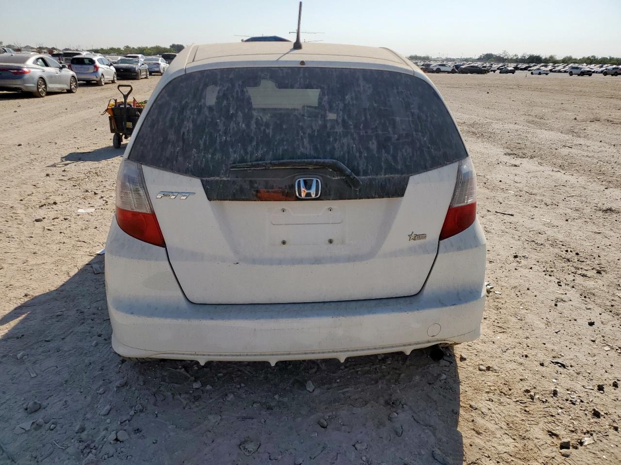 2012 Honda Fit VIN: JHMGE8H38CC033925 Lot: 85310305