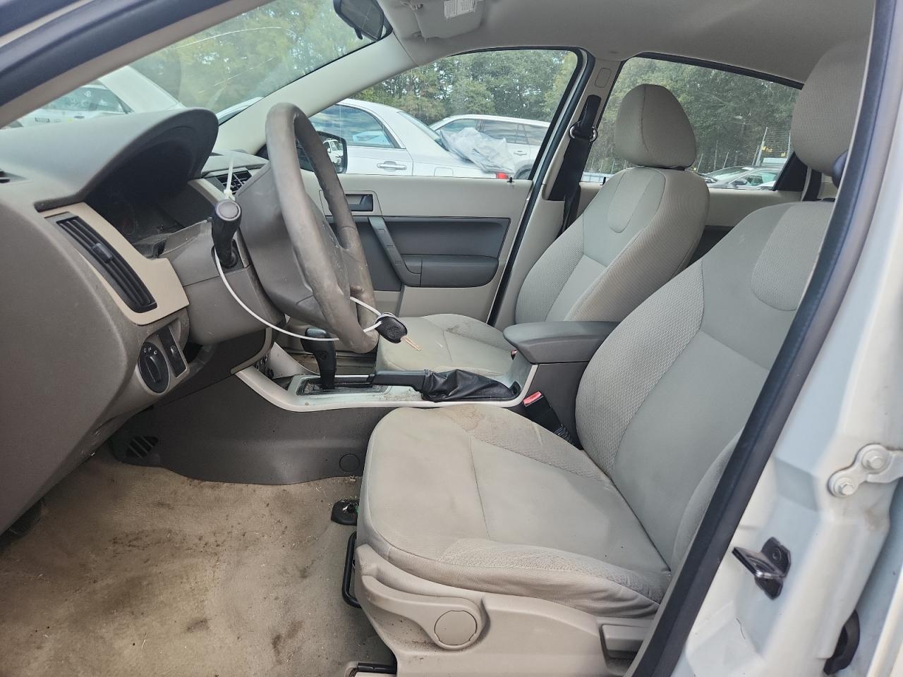 2009 Ford Focus S VIN: 1FAHP34N69W133464 Lot: 85571585