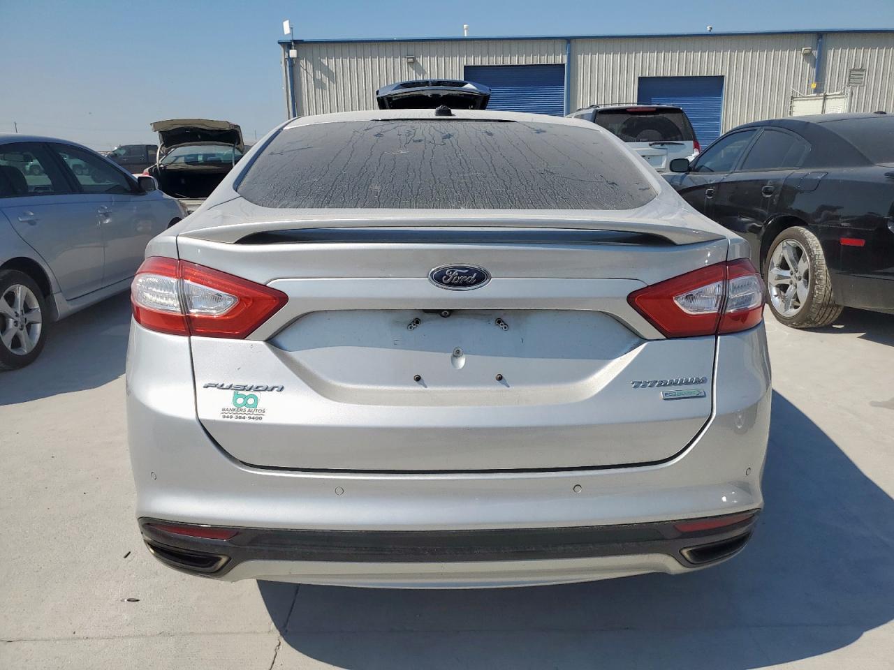 2015 Ford Fusion Titanium VIN: 3FA6P0K90FR297075 Lot: 86089165