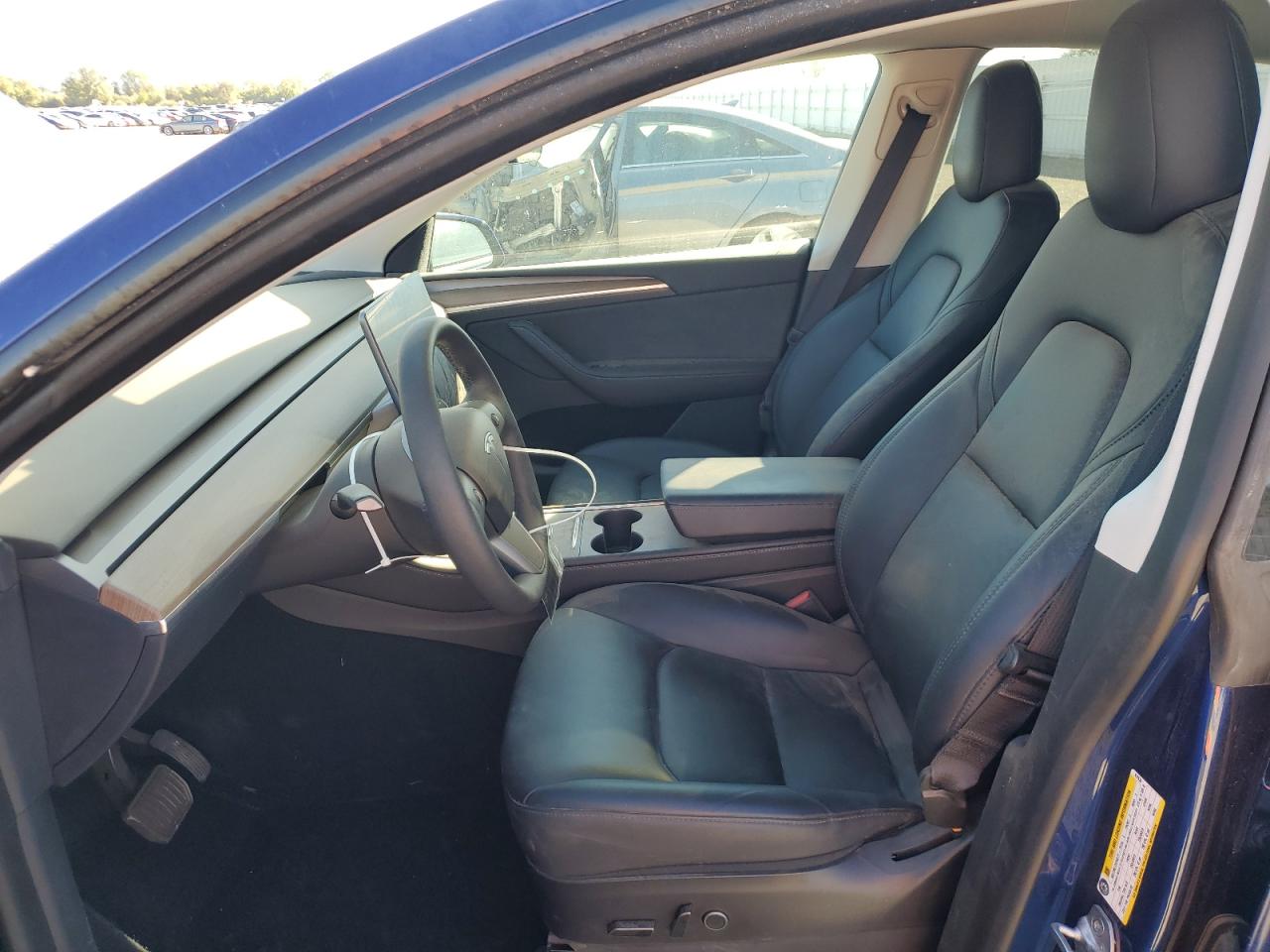 2023 Tesla Model Y VIN: 7SAYGDEE2PF631633 Lot: 80644745