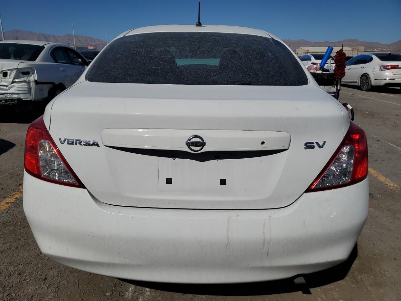 2012 Nissan Versa S VIN: 3N1CN7AP0CL927898 Lot: 85871515