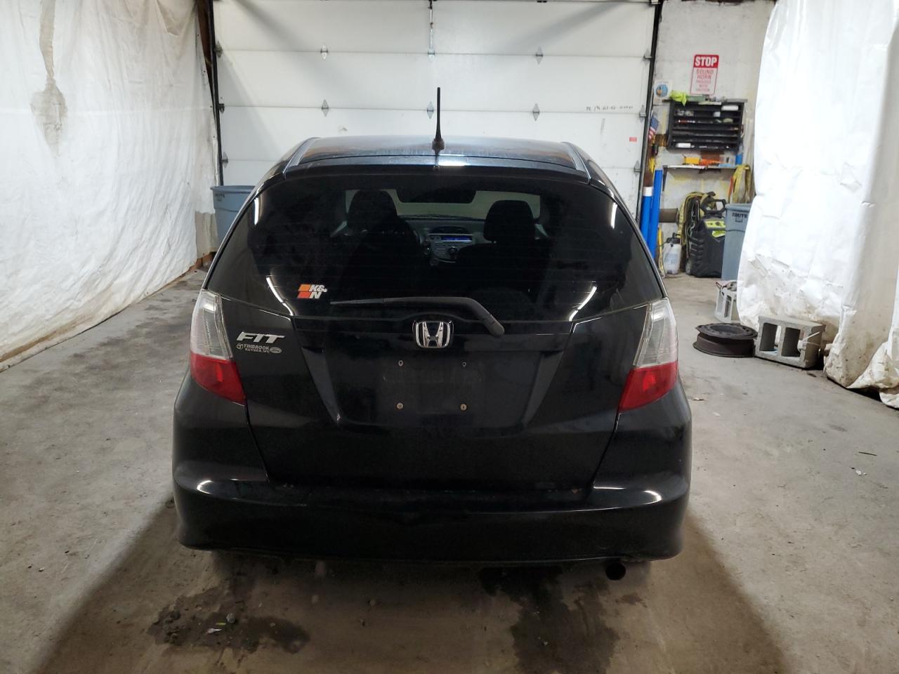 2011 Honda Fit VIN: JHMGE8G35BC007122 Lot: 82560465