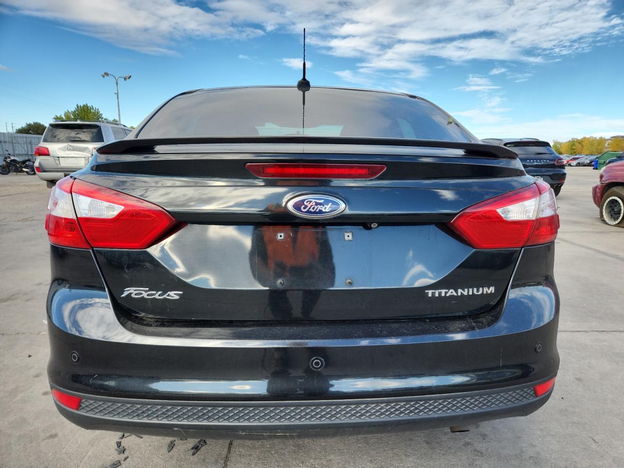 2014 Ford Focus Titanium VIN: 1FADP3J28EL224272 Lot: 86531015