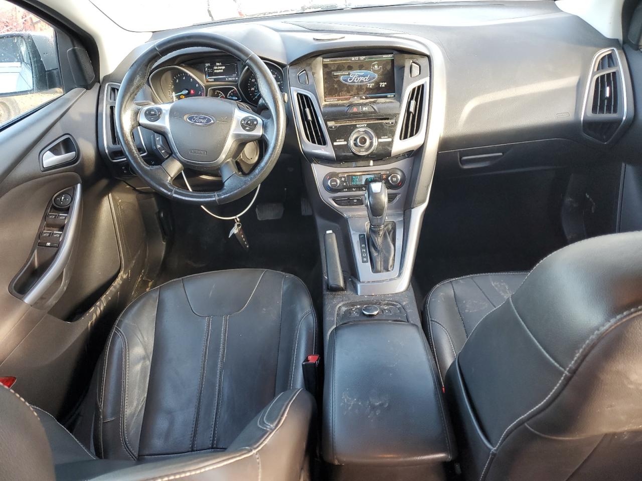 2014 Ford Focus Titanium VIN: 1FADP3J23EL280409 Lot: 82561165
