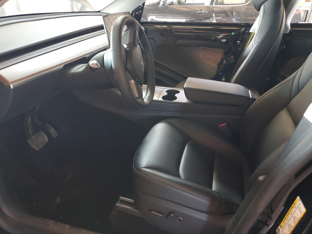 2025 Tesla Model Y VIN: 7SAYGDED2SF270100 Lot: 82744585