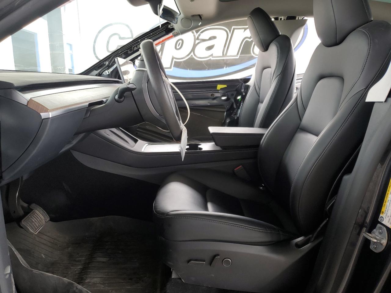 2024 Tesla Model Y VIN: 7SAYGAEE7RF129041 Lot: 82703015