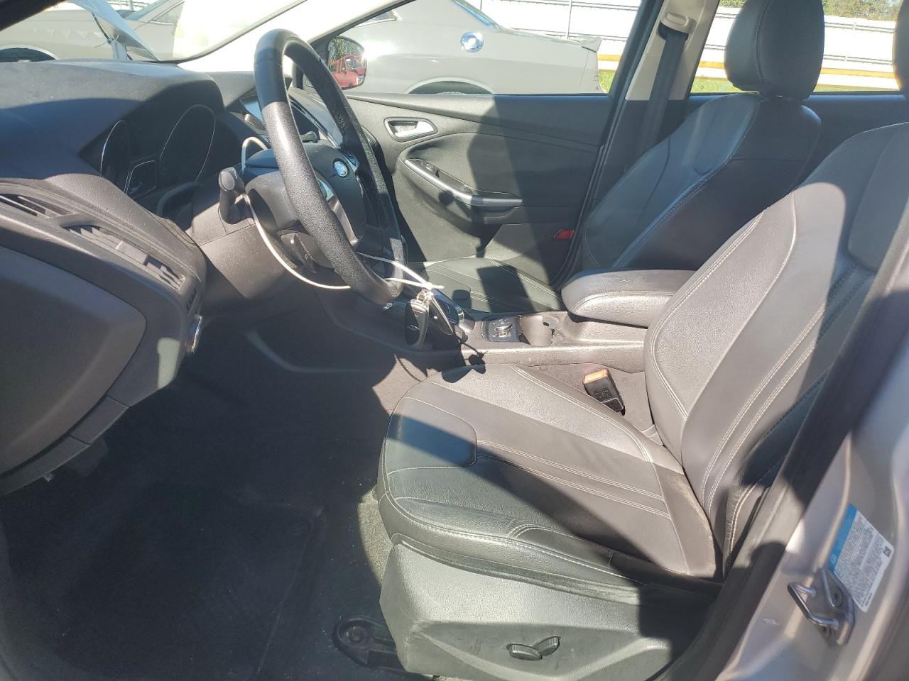 2014 Ford Focus Titanium VIN: 1FADP3N22EL209180 Lot: 82577545