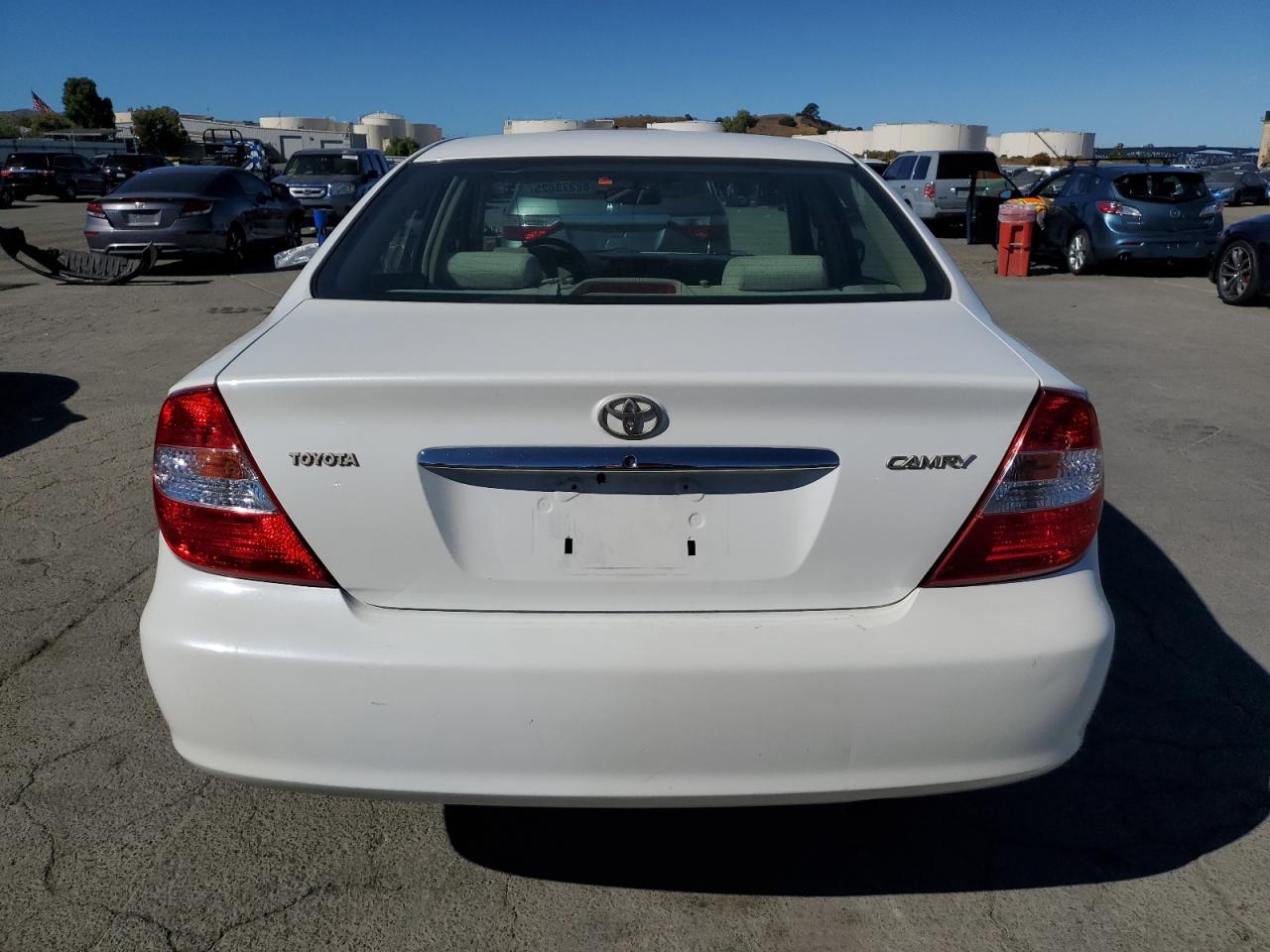2004 Toyota Camry Le VIN: JTDBE30KX40269724 Lot: 82373625