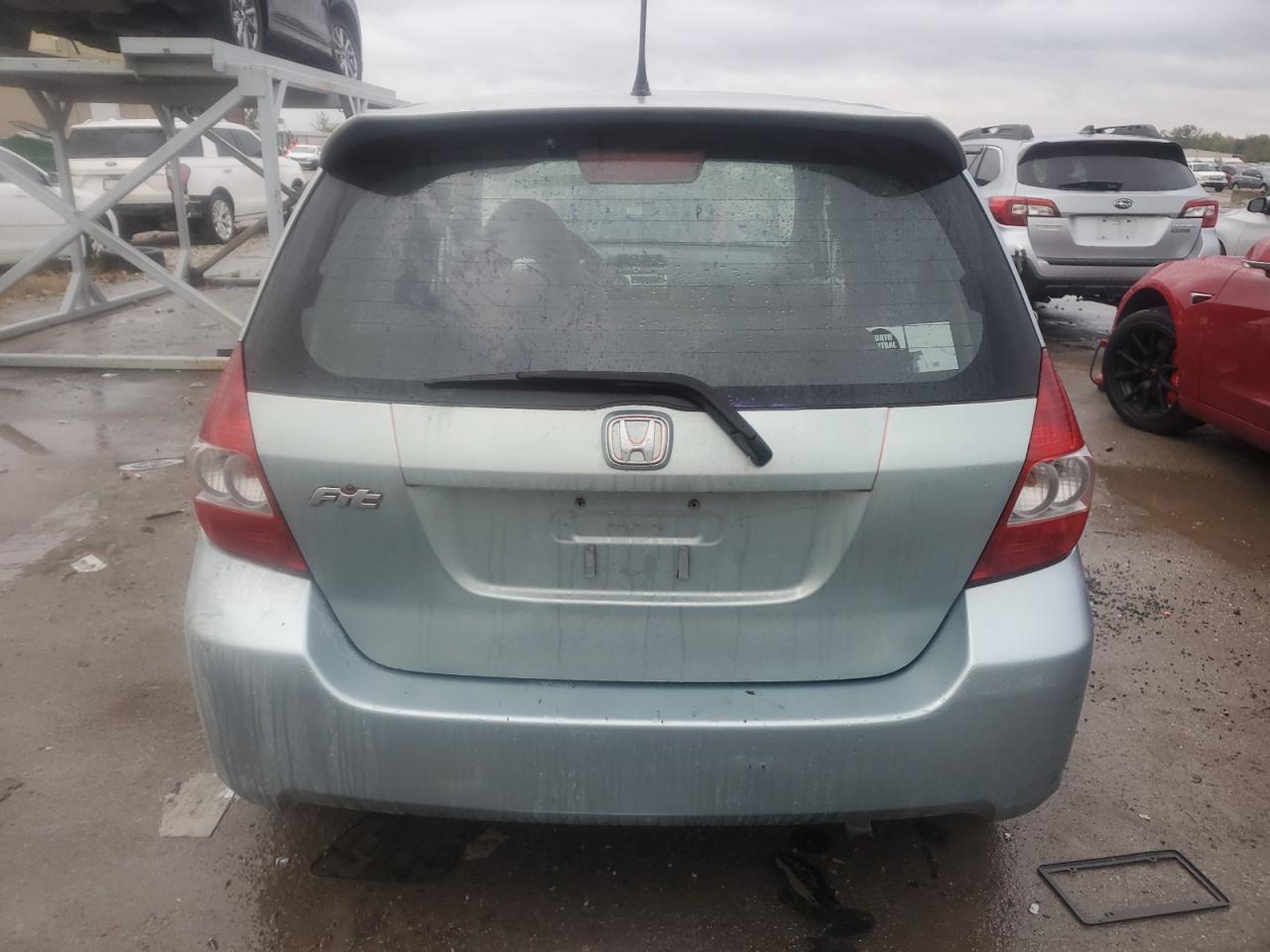 2007 Honda Fit VIN: JHMGD38437S061917 Lot: 90583195