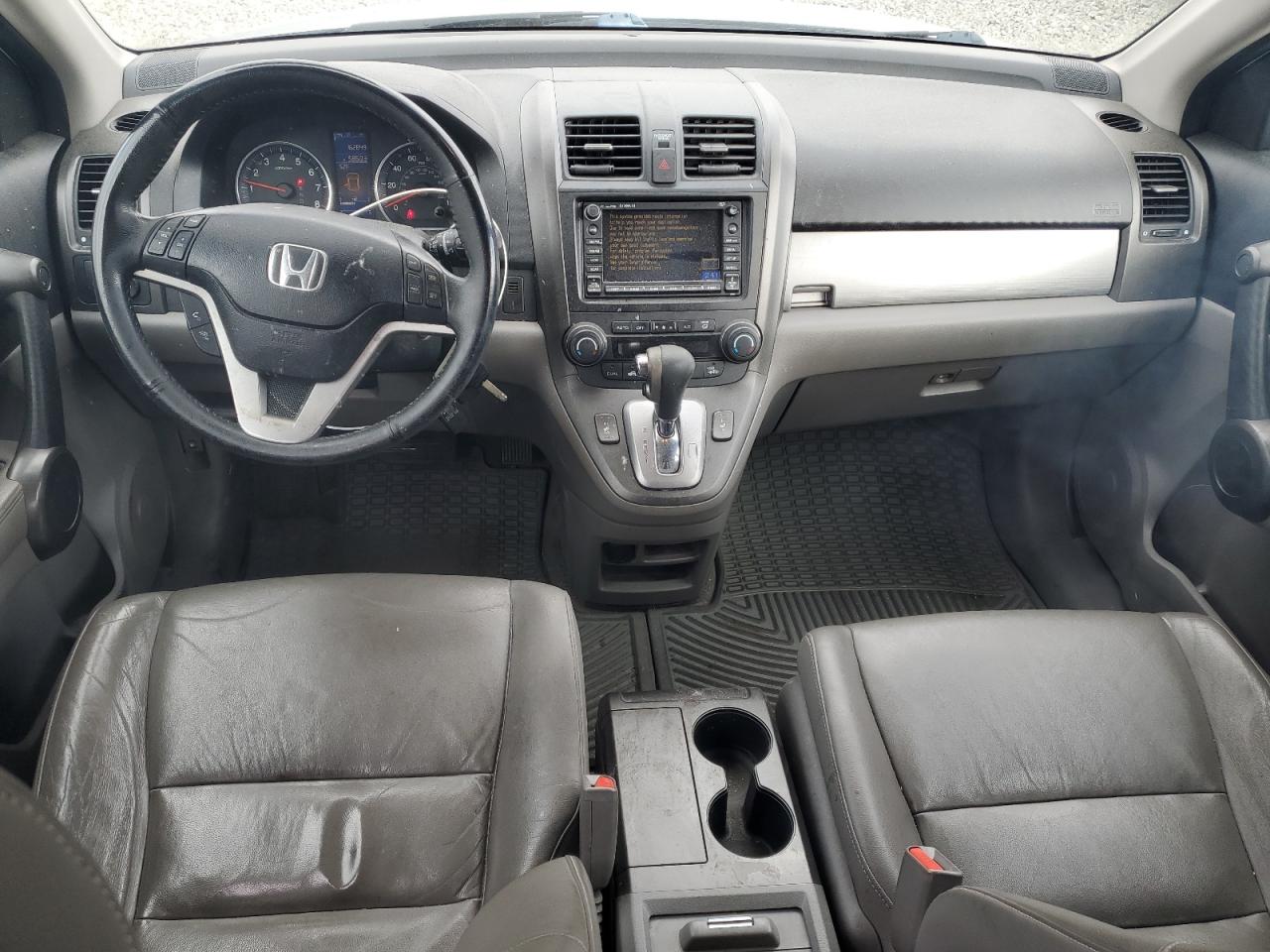 2010 Honda Cr-V Exl VIN: JHLRE4H75AC009409 Lot: 82531335
