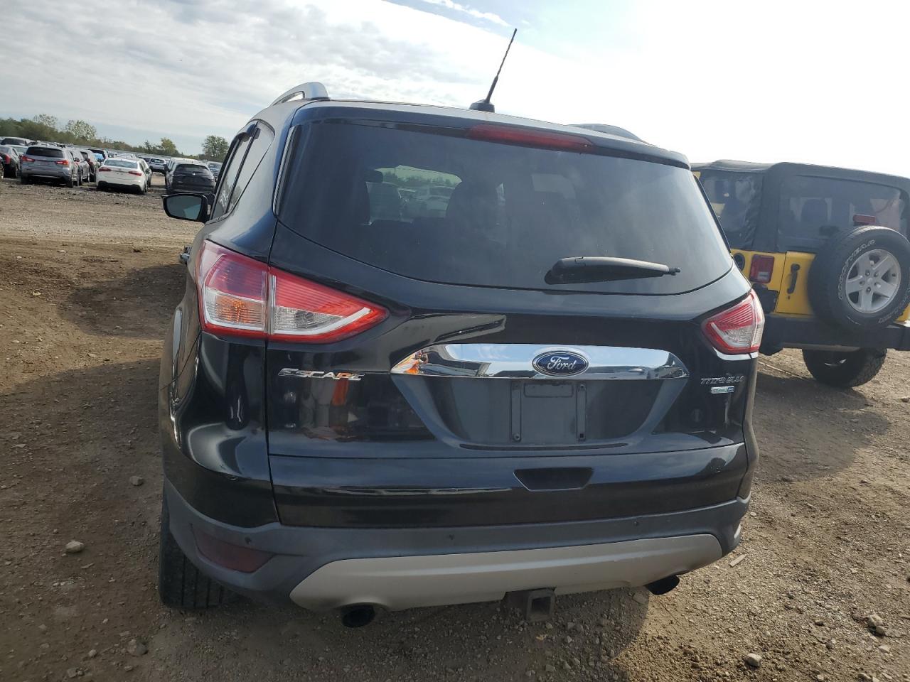 2014 Ford Escape Titanium VIN: 1FMCU9J99EUB60649 Lot: 85941105