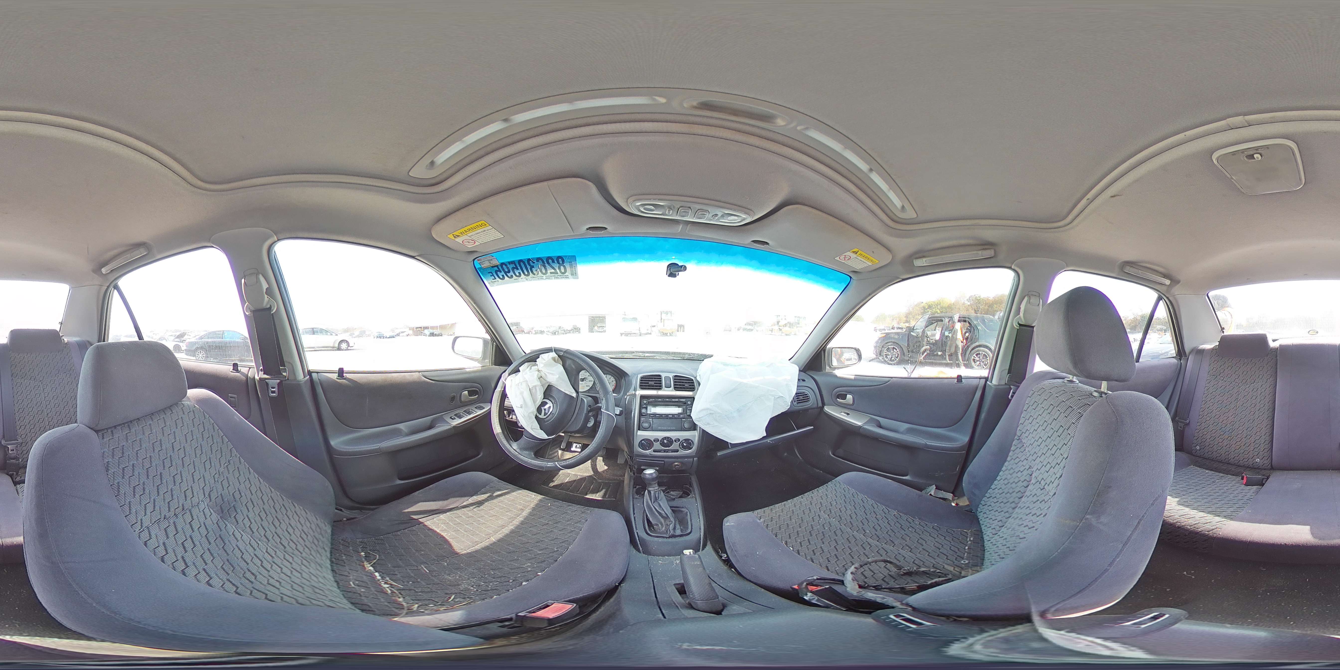 2002 Mazda Protege VIN: JM1BJ225721584923 Lot: 82630595