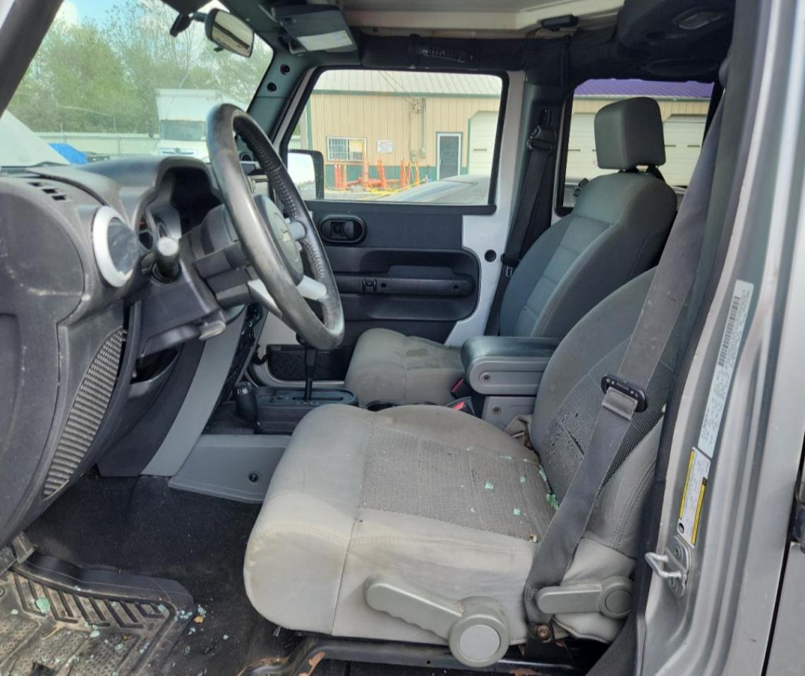 2009 Jeep Wrangler Unlimited Sahara VIN: 1J8GA59129L752033 Lot: 82254955