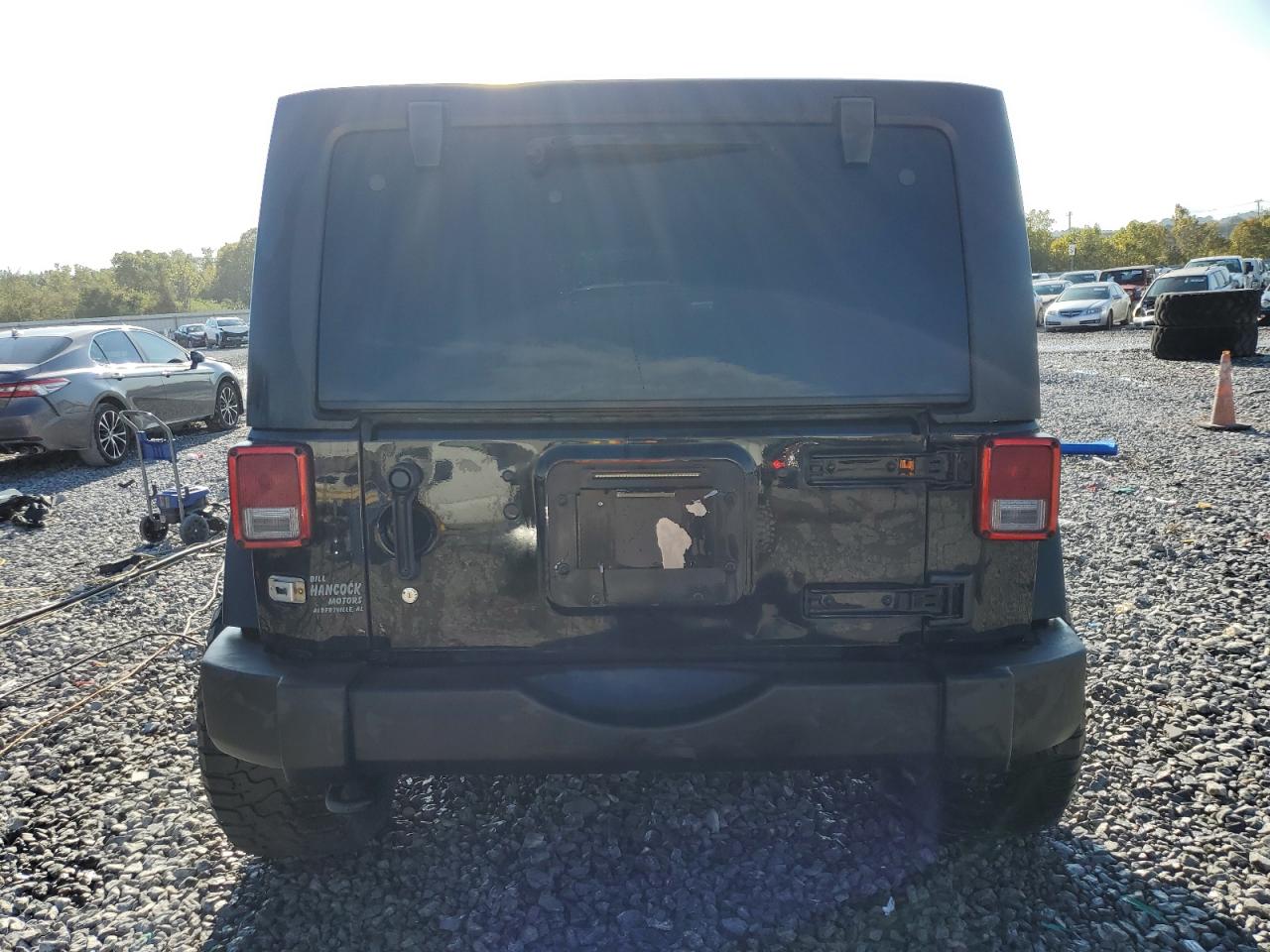 2015 Jeep Wrangler Unlimited Sport VIN: 1C4BJWDG9FL771032 Lot: 85364425