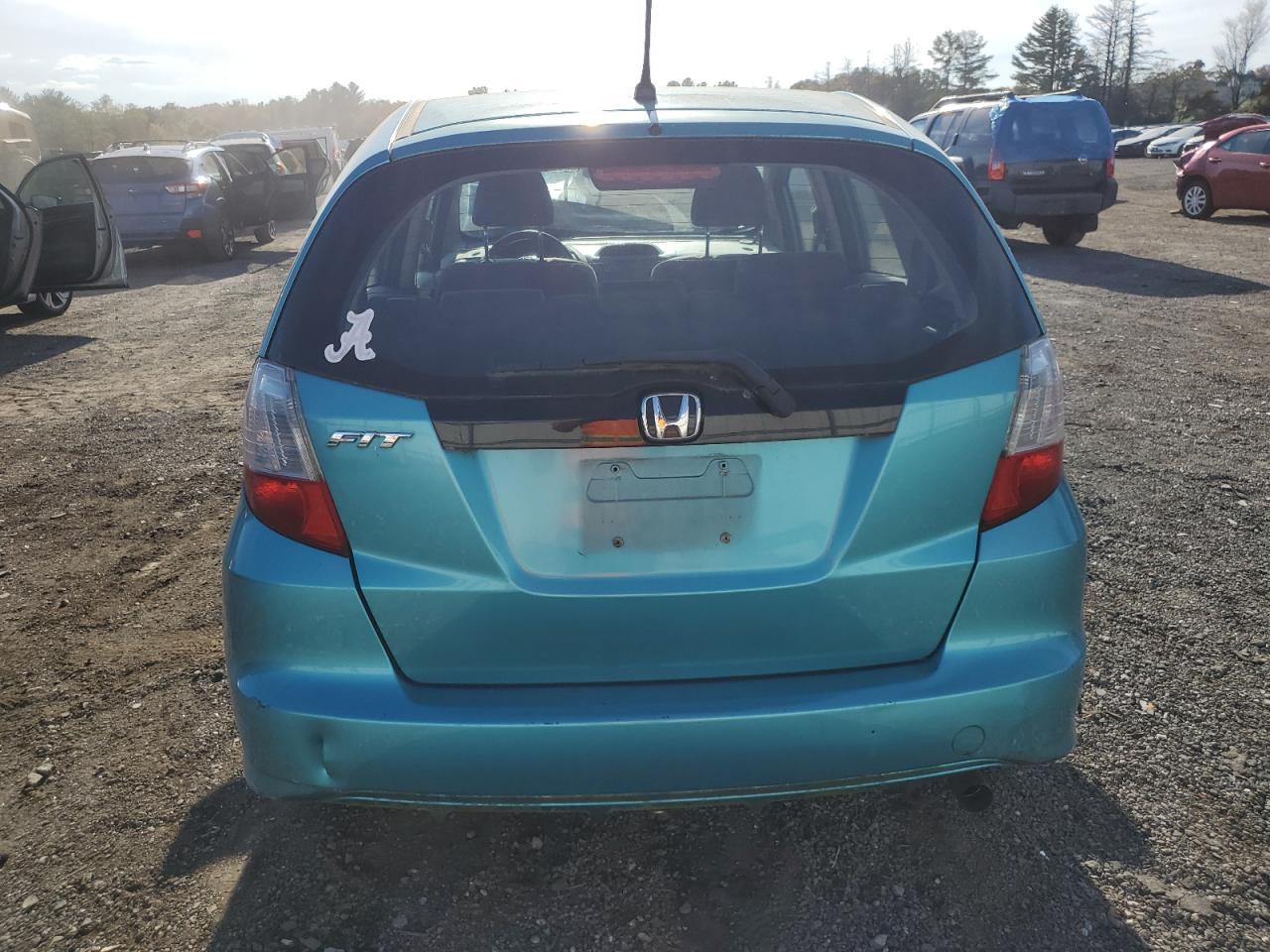 2012 Honda Fit VIN: JHMGE8H3XCC018892 Lot: 85393395