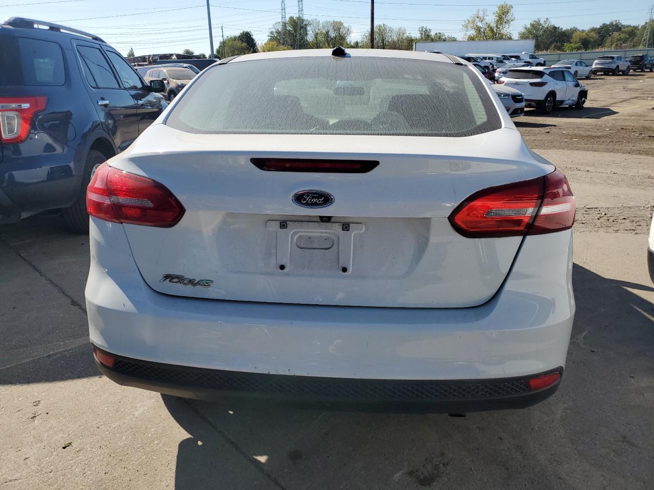 2018 Ford Focus S VIN: 1FADP3E26JL215865 Lot: 85100395