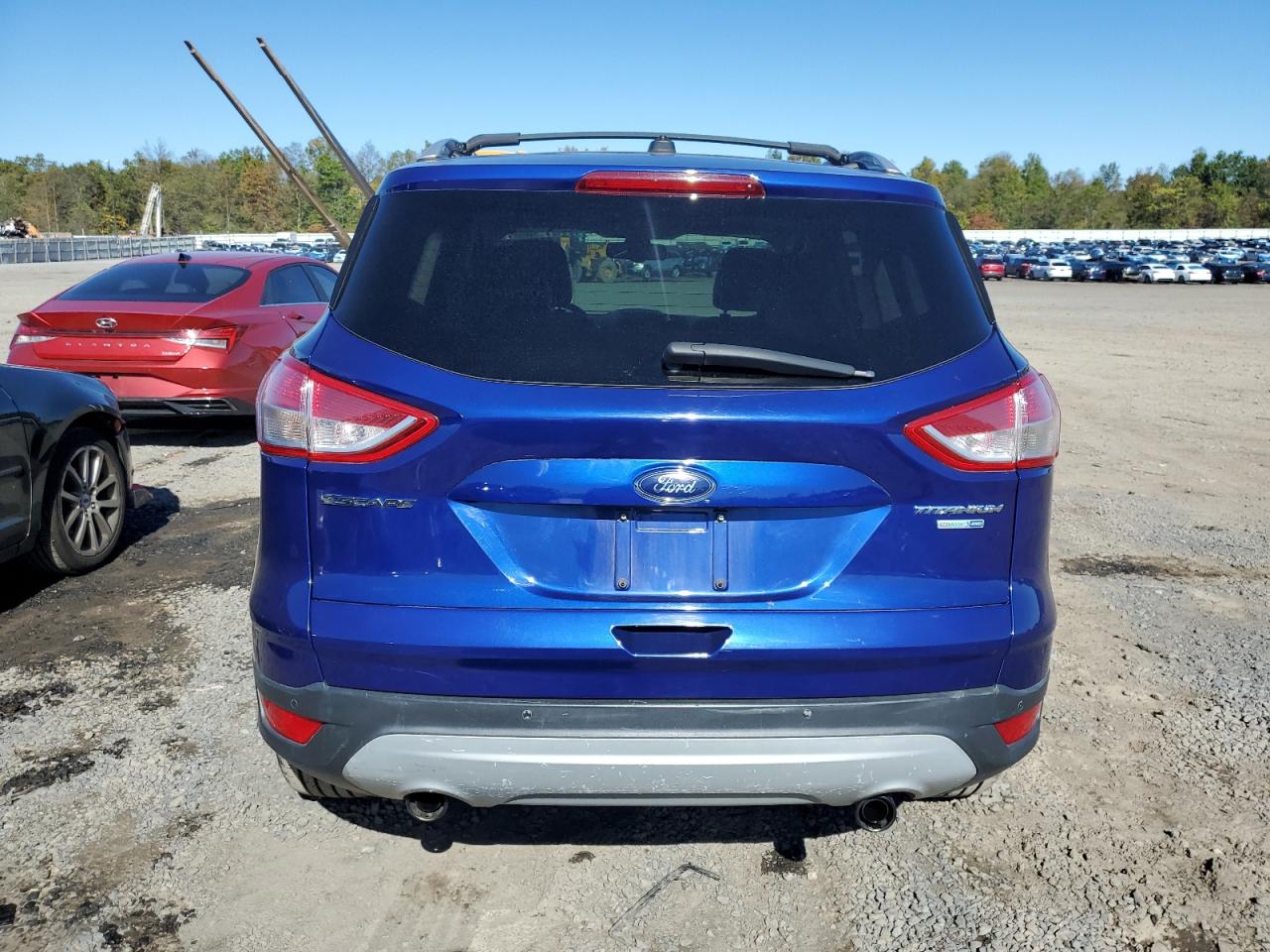 2013 Ford Escape Titanium VIN: 1FMCU9J91DUC99477 Lot: 82395425